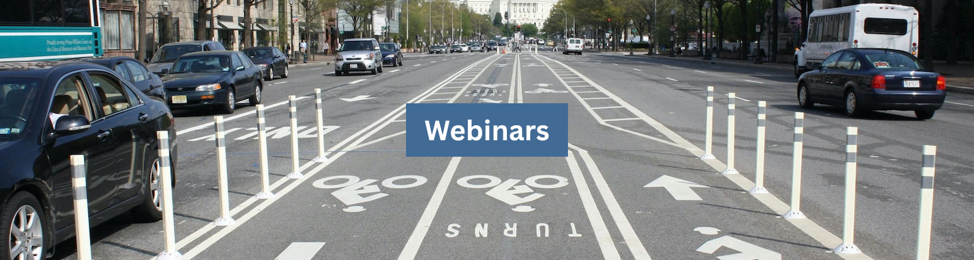 Photo of a busy city street with a bike lane in the middle, with a text overlay that says Webinars